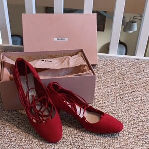 Miu Miu Red Heeled Shoes with Elegant Design